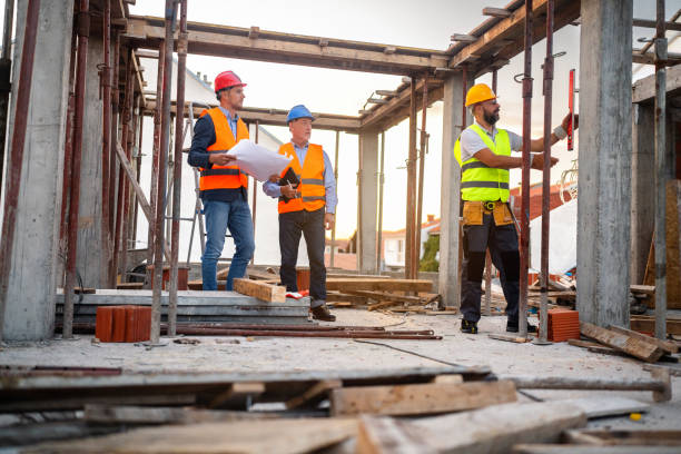 istock At the construction site, Caucasian architect, building contractor and engineer, having an meeting 1757790848