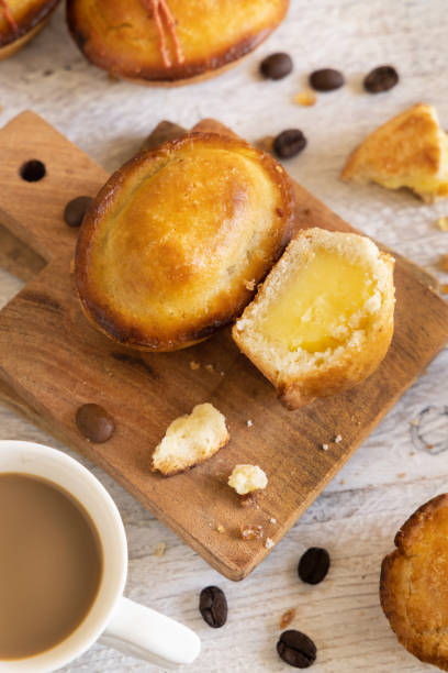 istock Pasticciotto leccese pastry filled with egg custard cream on a wooden board top view 1757796546
