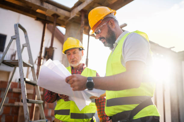 istock Caucasian architect and engineer having an meeting about project on a construction site 1757799304