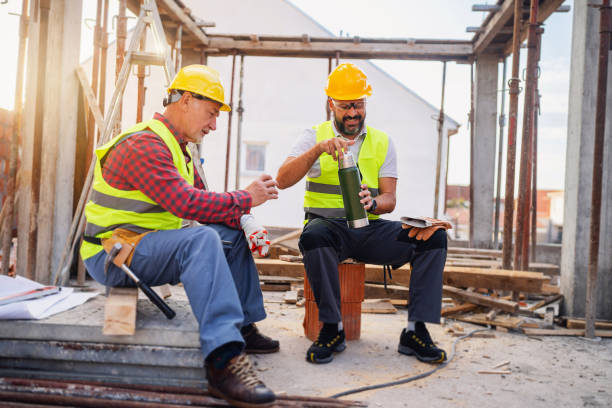 istock Male Caucasian construction workers, having an break on a construction site 1757803785