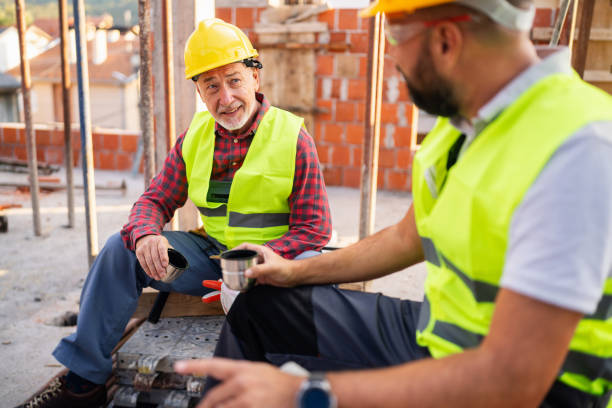 istock Male Caucasian construction workers, having an break on a construction site 1757805353