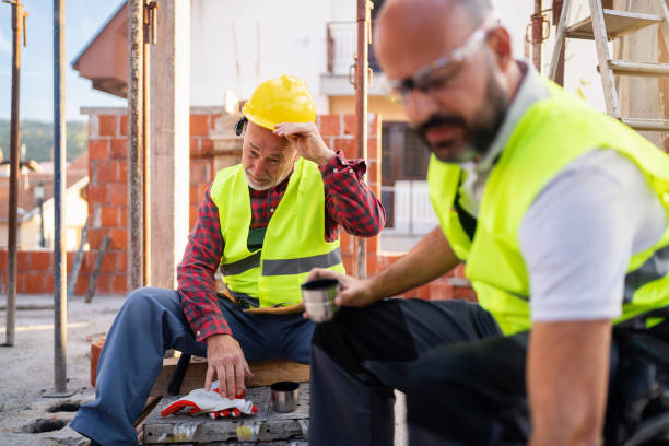 istock Male Caucasian construction workers, having an break on a construction site 1757805360