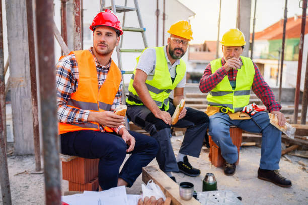 istock Group of Caucasian construction workers having an lunch break on a construction site 1757808140