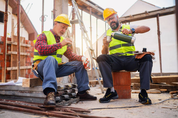 istock Male Caucasian construction workers, having an break on a construction site 1757813126