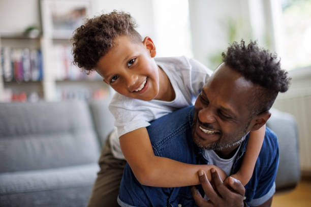 istock Father and son having fun at home 1757822600