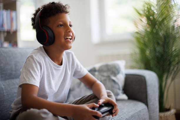istock African-American boy playing video games online 1757822613