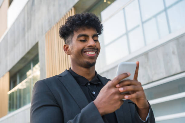istock Successful arab young businessman using phone outodoors 1757827053