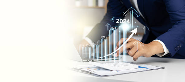 istock Businessman profit analysis with augmented reality in 2024, 2024 positive indicators profitability and growth in business, businessman financial strategy calculating long term Investments for success. 1757861283