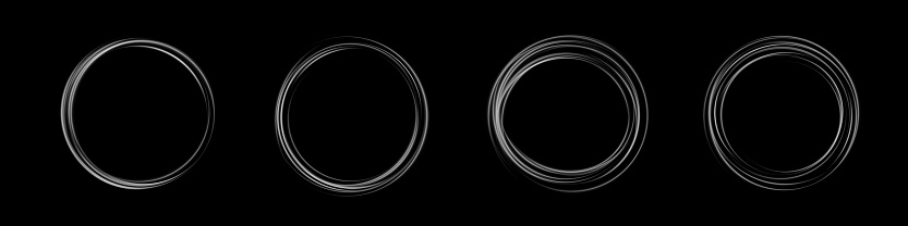 Set of white round frames isolated on black background. Light efects in the form of portal. Vector illustration.