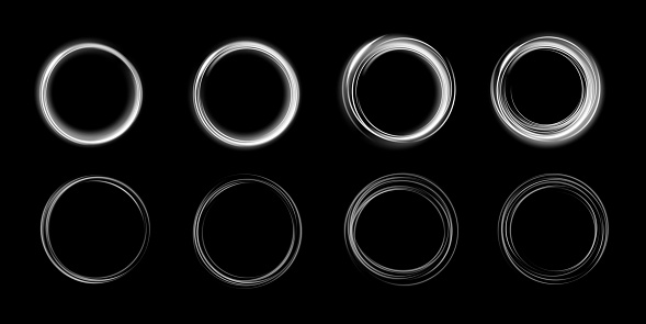 Set of white round frames isolated on black background. Light efects in the form of portal. Vector illustration.