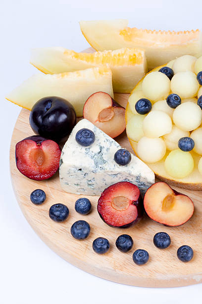 istock Various fruits on the plate. Melon, blueberries 175788437