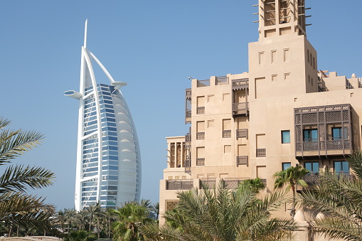 Dubai, UAE - October 6, 2023: Burj Al Arab hotel seen from Souk Madinat Jumeirah