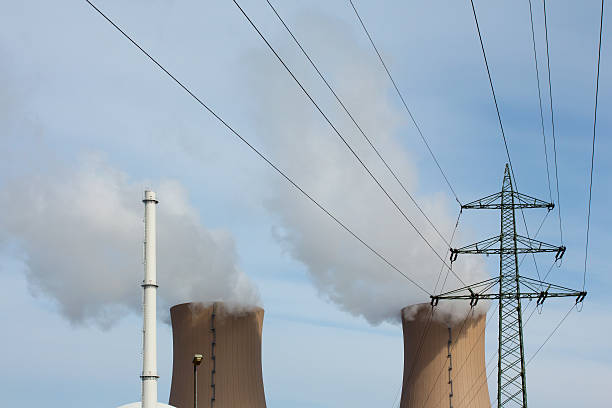 istock Nuclear plant and high-voltage lines against the sky 175789367