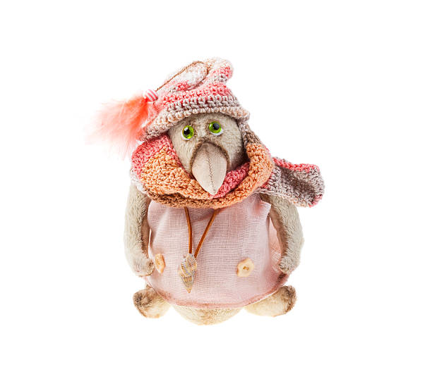 istock Plush bird with a knitted scarf and hat 175791526