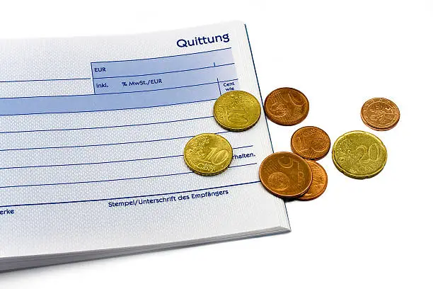 receipt with euro coins on white Background. Different Coins. Blue standard geman receipt (german quittung)