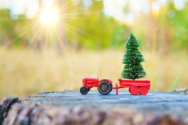istock Toy Tractor with Christmas Tree and Sun 1757935110