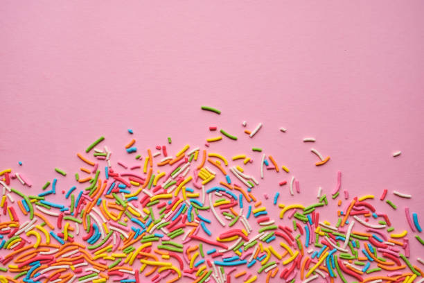 istock Multi-colored confectionery topping on a pink. 1757942296
