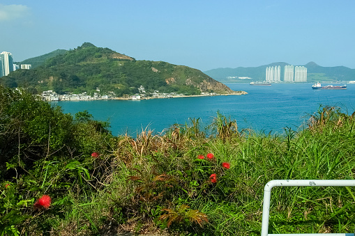 The view of Hong Kong rural scene with calm seascape at sunny day. Travel and nature scene.