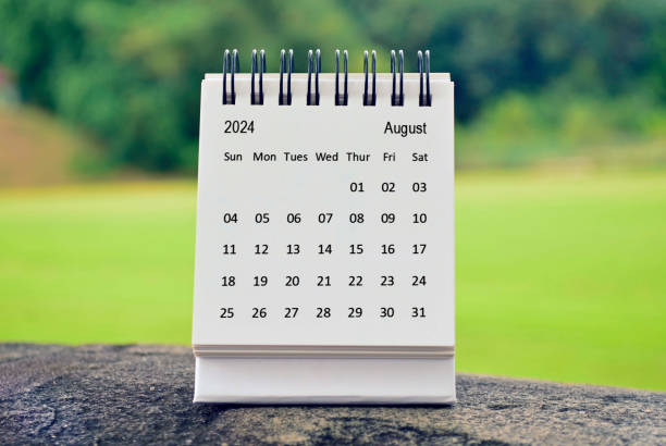 istock August 2024 white calendar with green blurred background. New year concept. 1758017161
