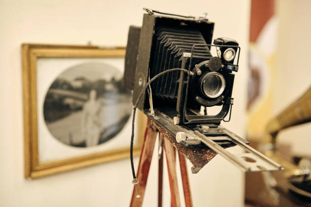 istock Vintage wooden box camera on a tripod 1758019603