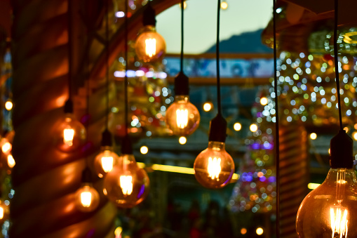 Focus of the Christmas decoration lighting, the yellow bulbs. Festival celebration concept.