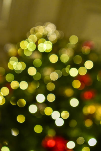 istock The bokeh effect of the Christmas tree. Colorful lighting. 1758021003