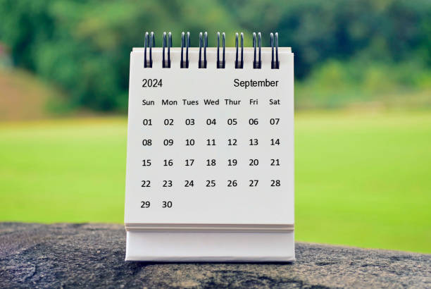 istock September 2024 white calendar with green blurred background. New year concept 1758023068