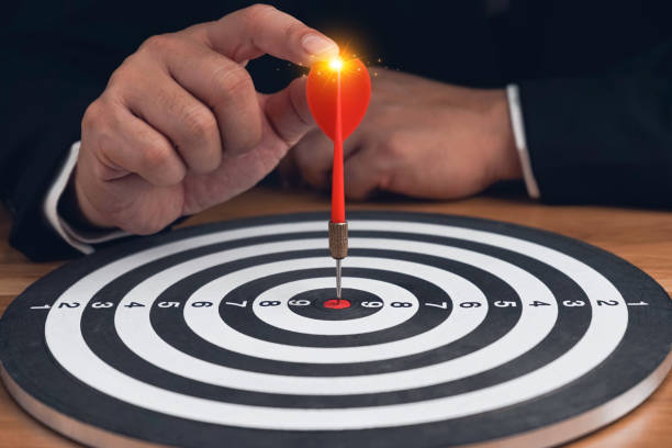 istock Targeting the business concept, Businessman throwing red arrow dart to virtual target dart board.Setup objectives and target for business investment concept,Digital marketing,Business target concept 1758024673
