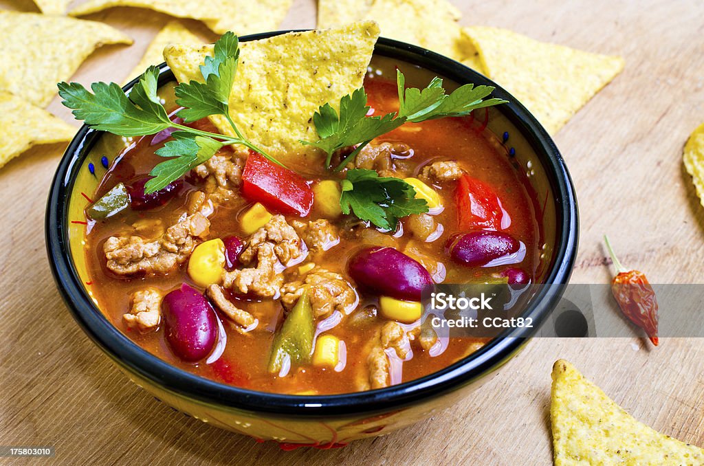 Mexican soup with tacos Mexican soup (like chili con carne) with tacos Soup Stock Photo