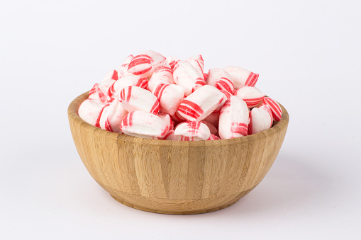 Large red and white lollipop on a white background