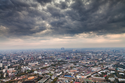 dark grey autumn clouds under big city, Moscow