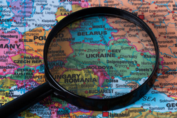 istock Map of Ukraine through magnifying glass. 1758040261