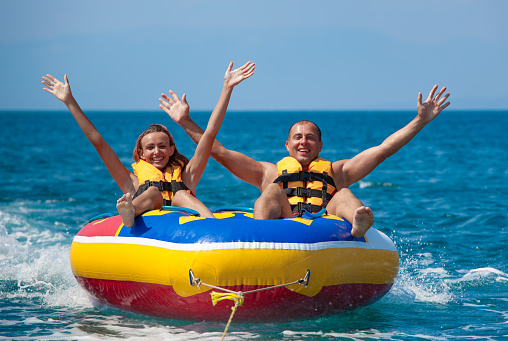 Minsk, Belarus - July, 15: Women on a pleasure boat ride in the breeze and have fun