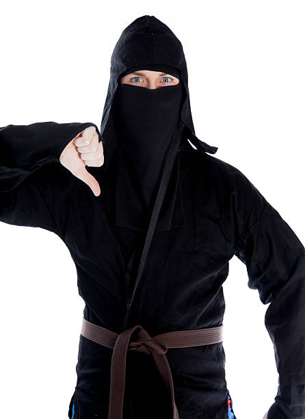 istock caucasian man disguised as a ninja isolated on white 175808849