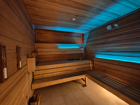 Close-up shot of Modern Sauna Room with blue light in Wellness Center