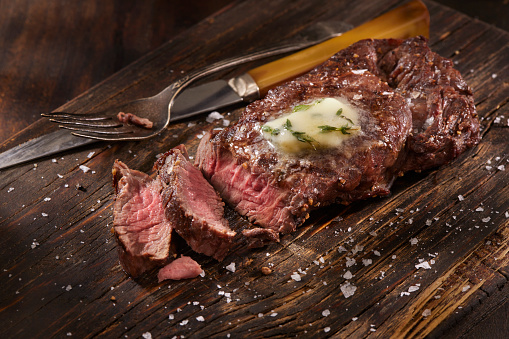 Medium Rare Venison Strip Loin Steak with Finishing Salt and Herb Compound Butter