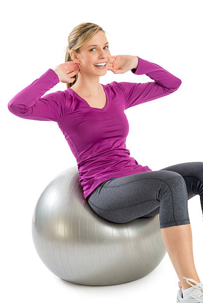 istock Woman Smiling While Exercising On Pilates 175811480
