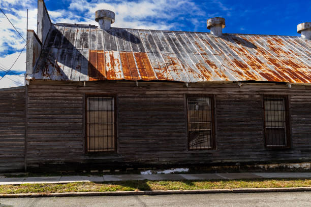 istock Wood planked abandoned warehouse with tin roof 1758115263