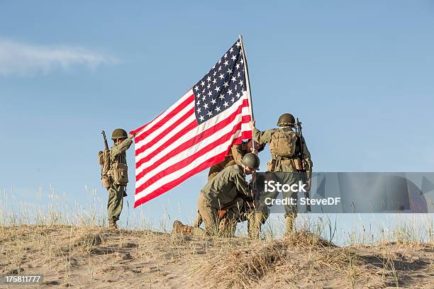 Ww2 Soldiers Raising The Flag Stock Photo - Download Image Now - American Culture, Battlefield, Flag