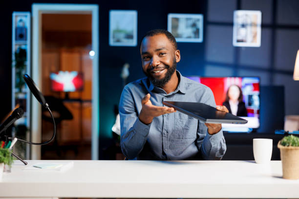 istock Man plays with laptop during review 1758121234