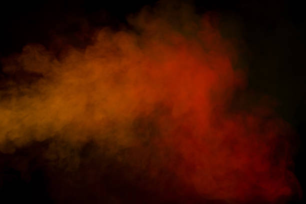istock Orange and red steam on a black background. 1758173208