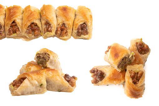 Delicious sweet baklava with walnuts isolated on white background. Top view.