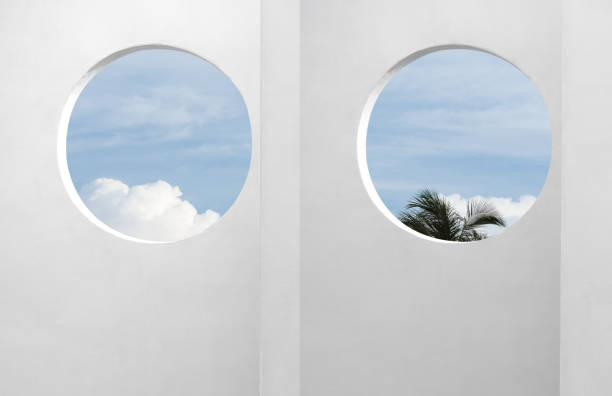 istock Architecture minimal exterior white wall cement surface texture,Concrete house with open window against blue sky and clouds, Modern building geometry with summer sky and coconut palm leaves 1758175614