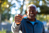 Senior black man with an I Voted Sticker