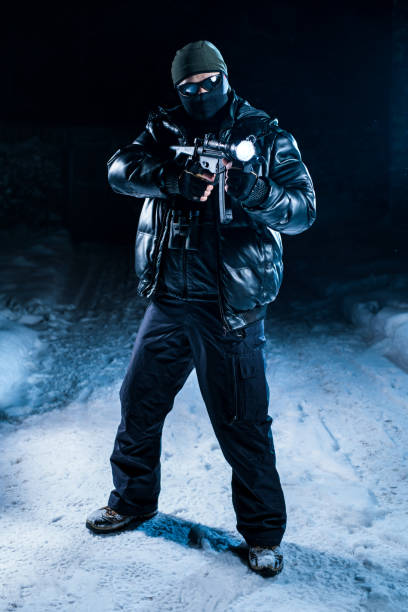 istock Military man winter posing at night 1758221700