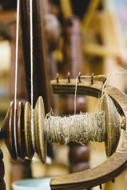 istock Linen thread being spun and wound onto a bobbin in an Irish cottage 1758241453