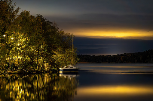 Stockholm, Sweden A night view of a navigation marker in the Vinterviken district on Lake Malaren.