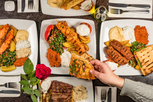 istock Middle Eastern foods with beef, hummus, Baba ghanoush 1758270588