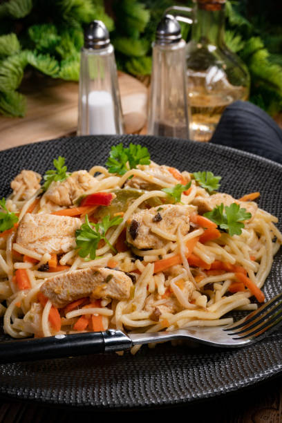 istock Fried noodles with chicken and vegetables. 1758282651