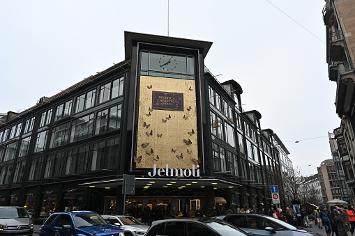 Zurich, Switzerland - 12 20 2022 Jelmoli, shopping center in the city center of Zurich selling luxury designer clothes, accessories, jewelry and houselhold articles. There is Christmas decoration.